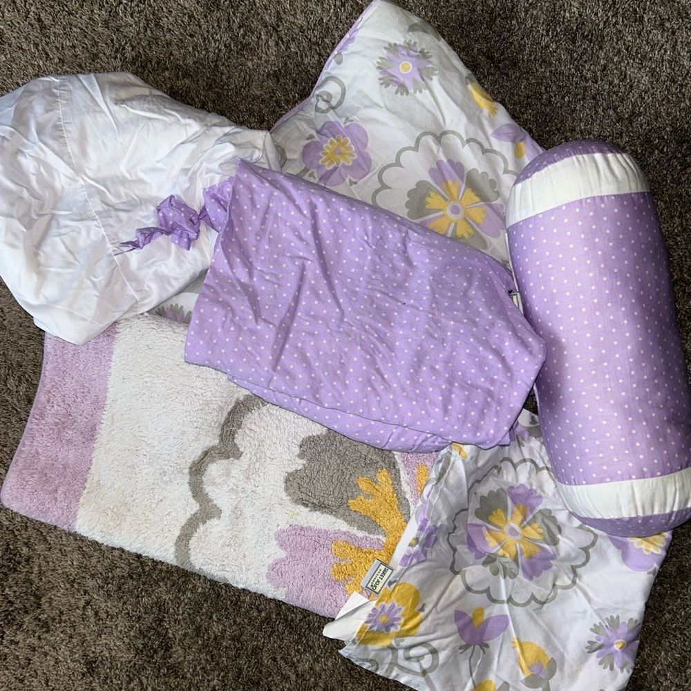 Sweet Jojo comforter, valance, 3 crib sheets, crib skirt, pillow and rug.